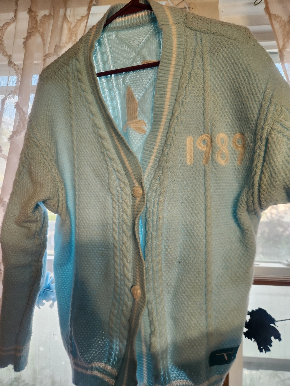 Light Blue Knit Cardigan Sweater with 1989 Detail